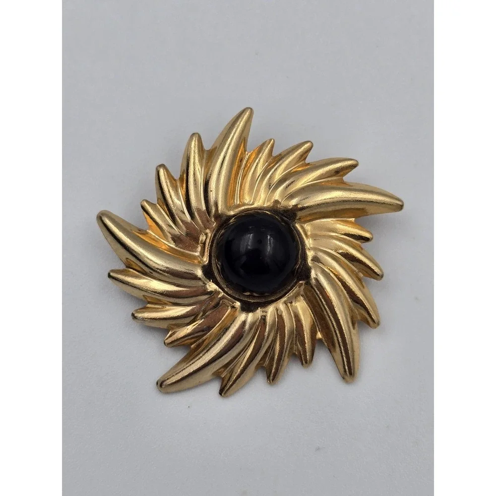 Vintage Gold Tone Swirl Sunburst Brooch Pin with Black Cabochon Center 1980s 90s